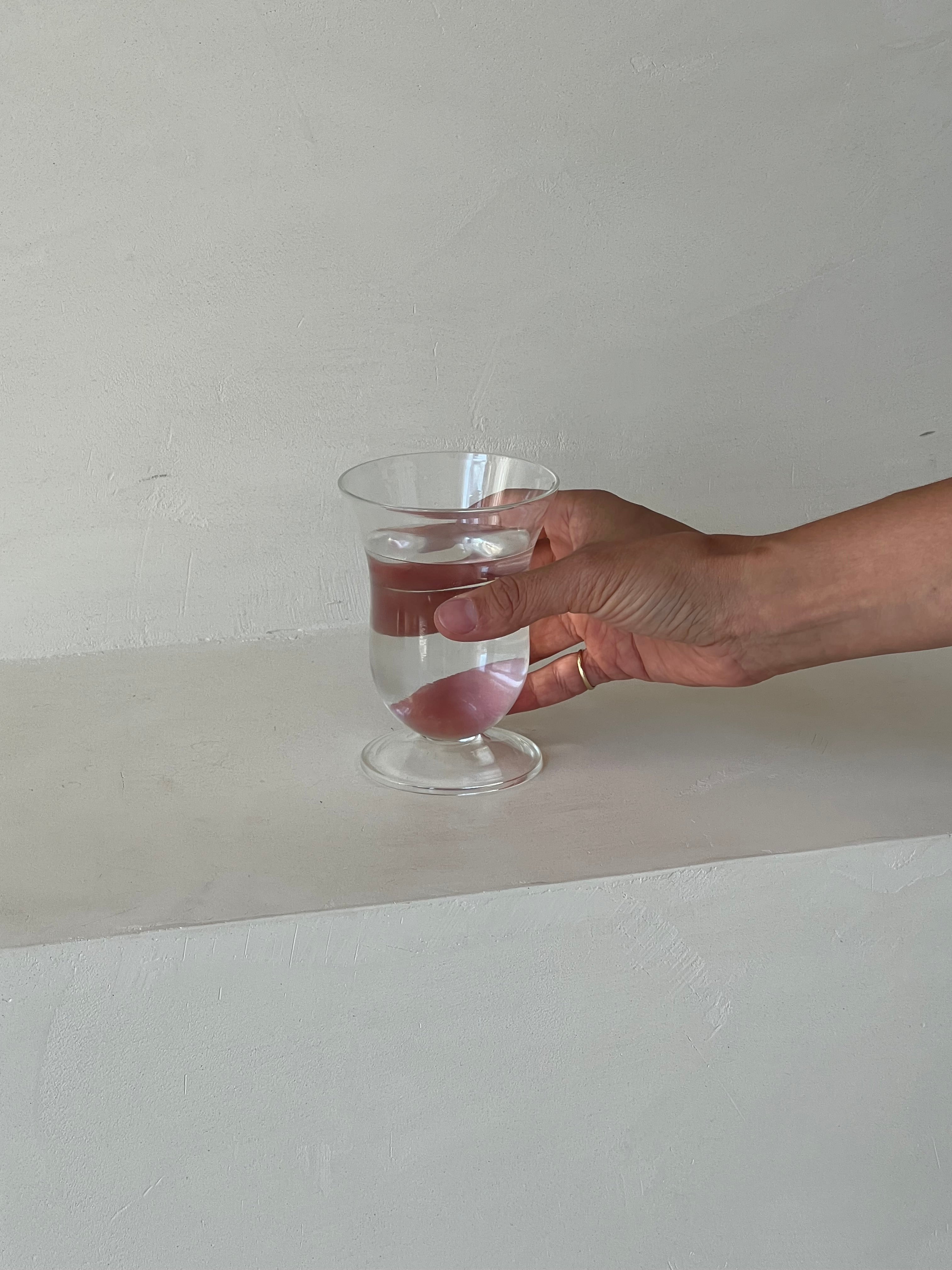 Unique, handblown curvy water glass.