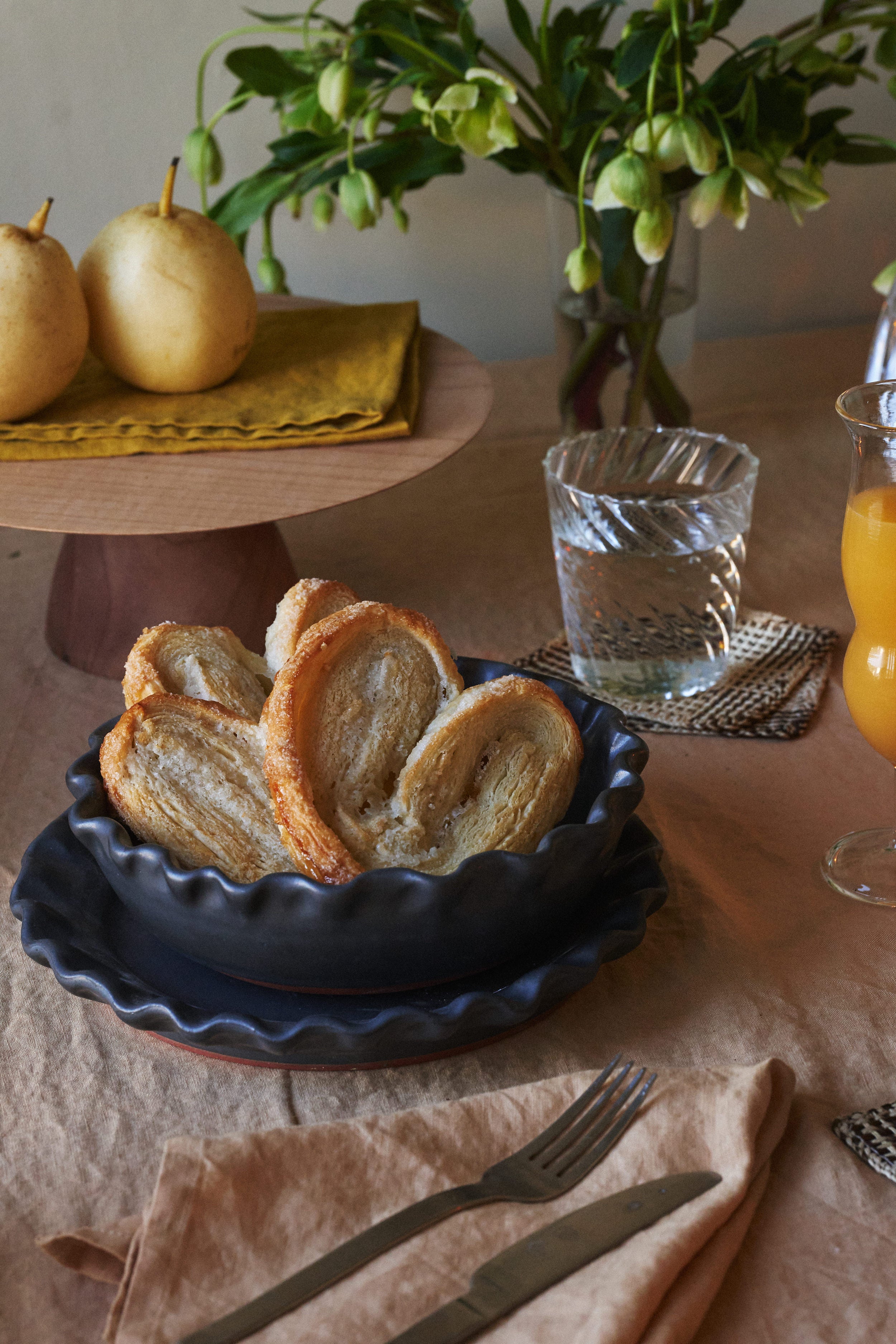 Hand-dyed 100% cotton tussor tablecloth made by Arles Studio in nut, a light Sienna color.