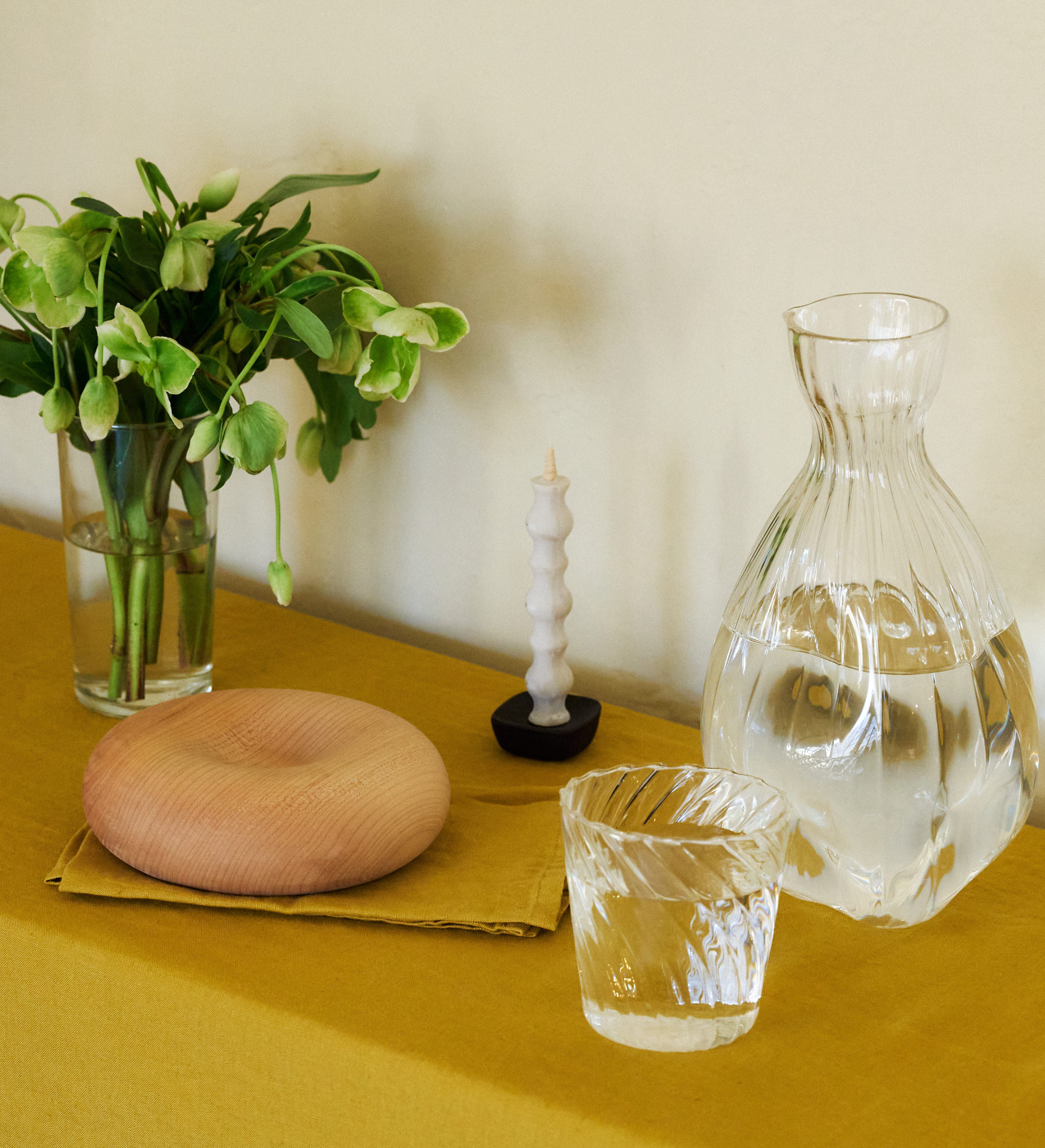 Hand-dyed 100% cotton tussor tablecloth made by Arles Studio in ochre, an earthy gold.