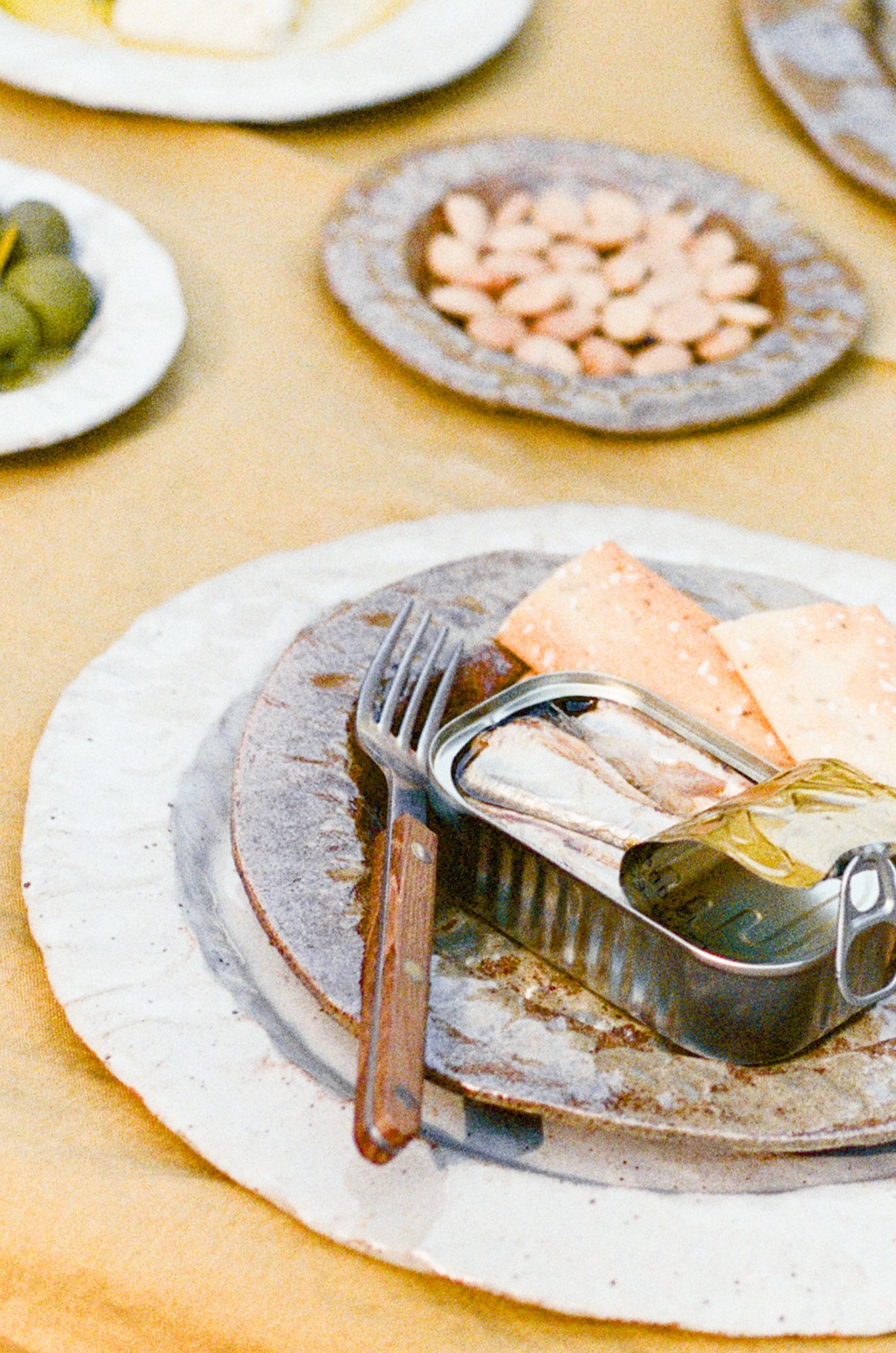 Handmade ceramic plates in varying sizes and colors.
