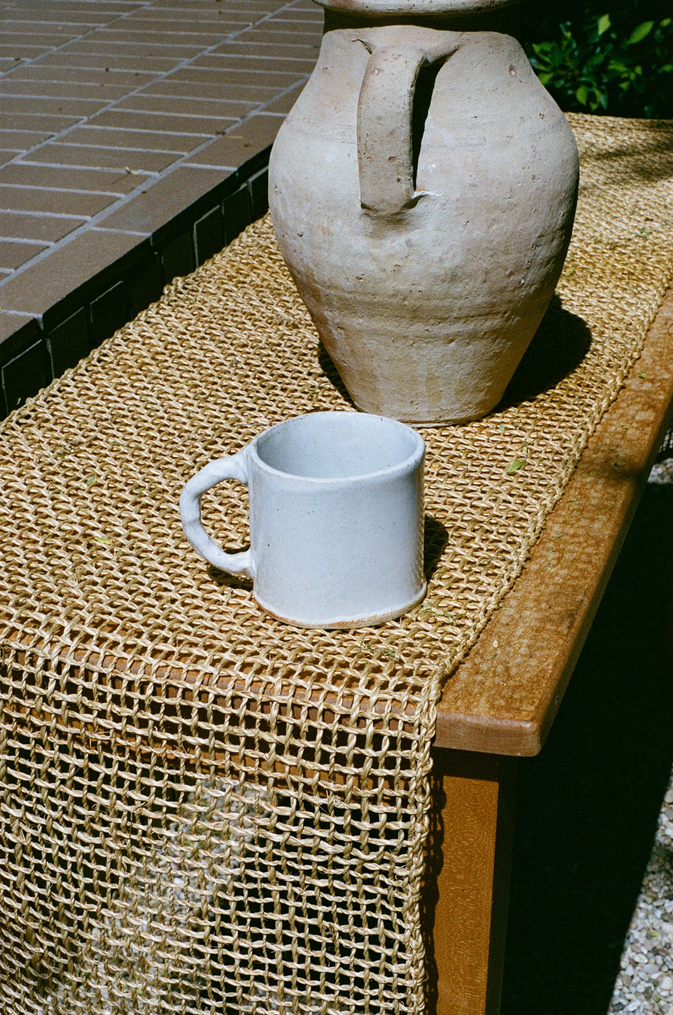 White ceramic mug on table.