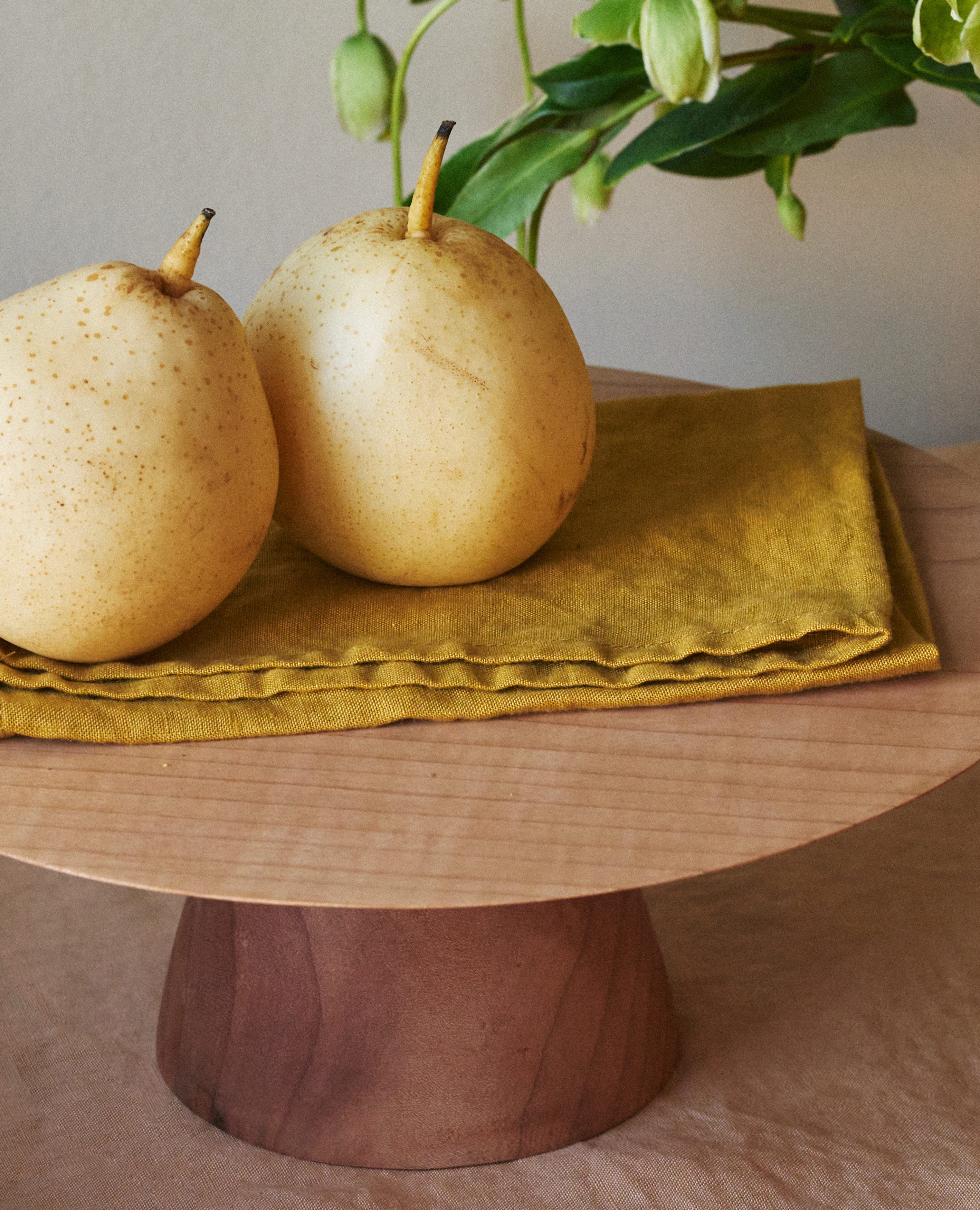 Hand-dyed 100% cotton tussor napkins made by Arles Studio in ochre- an earthy gold.
